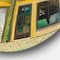 Designart - Yellow Facade of Houses In Street In Paris - French Country Metal Circle Wall Art